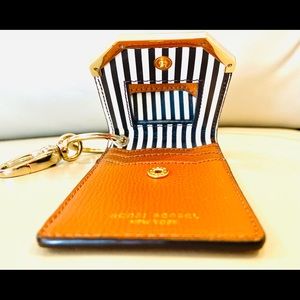 Exclusive Henri Bendel cardholder. C